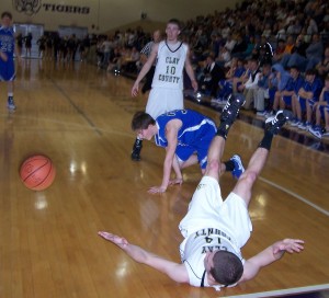 Scott Brown tries to take a charge against the Blue Devils, while Nolan Dale looks to see what the official called. 