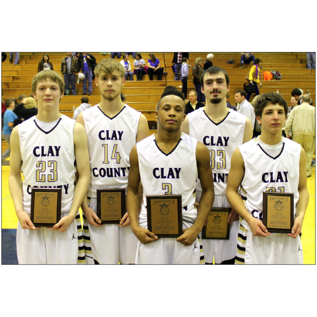 ACCOLADES-Corey Hamilton (center) was named the District 7A MVP, while (left to right) Jake Edwards, Eddie Roach, Dylan Carter, and J.R. Fraga were named to the all-tournament team.