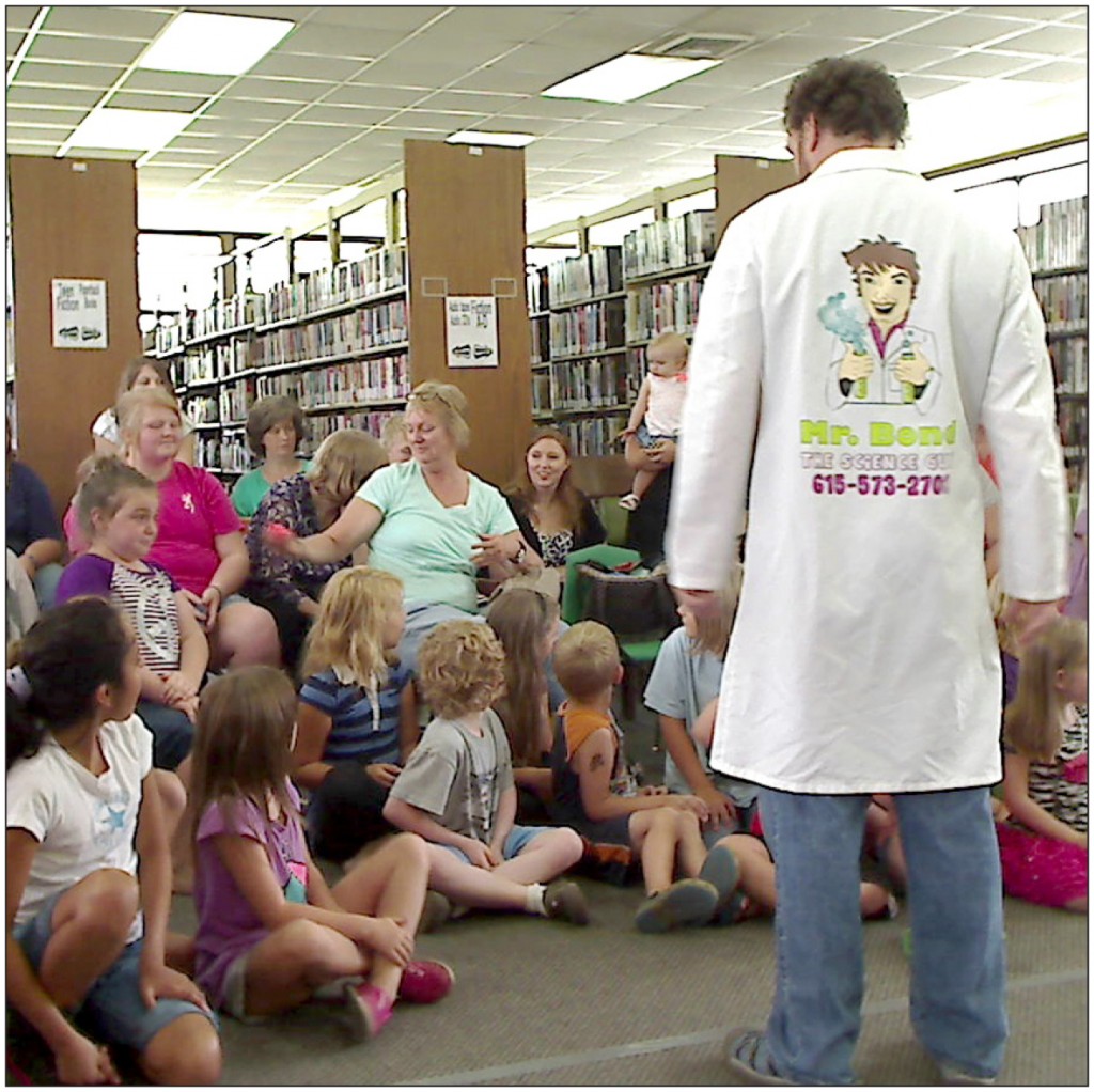 LEARNING AT THE LIBRARY-Keith Trehy, also known as “Mr. Bond the Science Guy”, entertains and educates the children at the Clay County Public Library. (photo submitted)