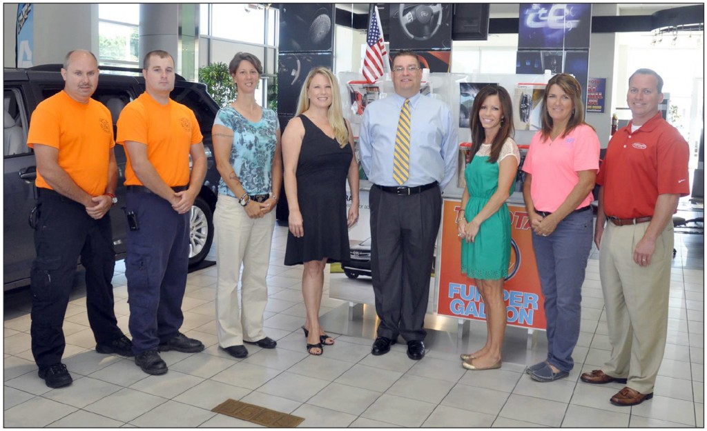 Winners of the Cumberland Toyota Charity Challenge (from left), James Allen King, Chief of East 52 Volunteer Fire Department and Chad Long, Assistant Chief of East 52 Volunteer Fire Department; Karen McMeekin, Founder/Director of A Time 4 Paws; Tammy Depperschmidt, Mustard Seed Ranch; Brandon Hall, Cumberland Toyota General Manager; Mary Ellen Parsons, Caring for Carcinoid Foundation; Gaye Ann Hill, Miss Fabulous Pageant, and Wayne Burkett, Marketing Director for Cumberland Auto.